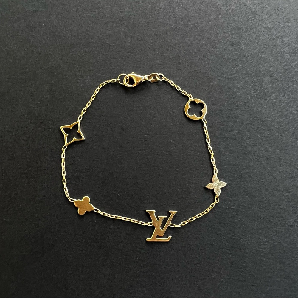 LV bracelet 14k Gold for sale.